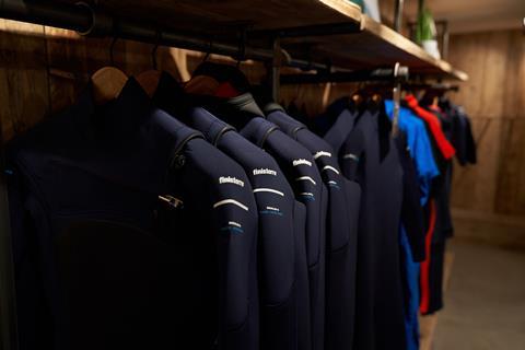 Wetsuits on display at Finisterre, Covent Garden, London
